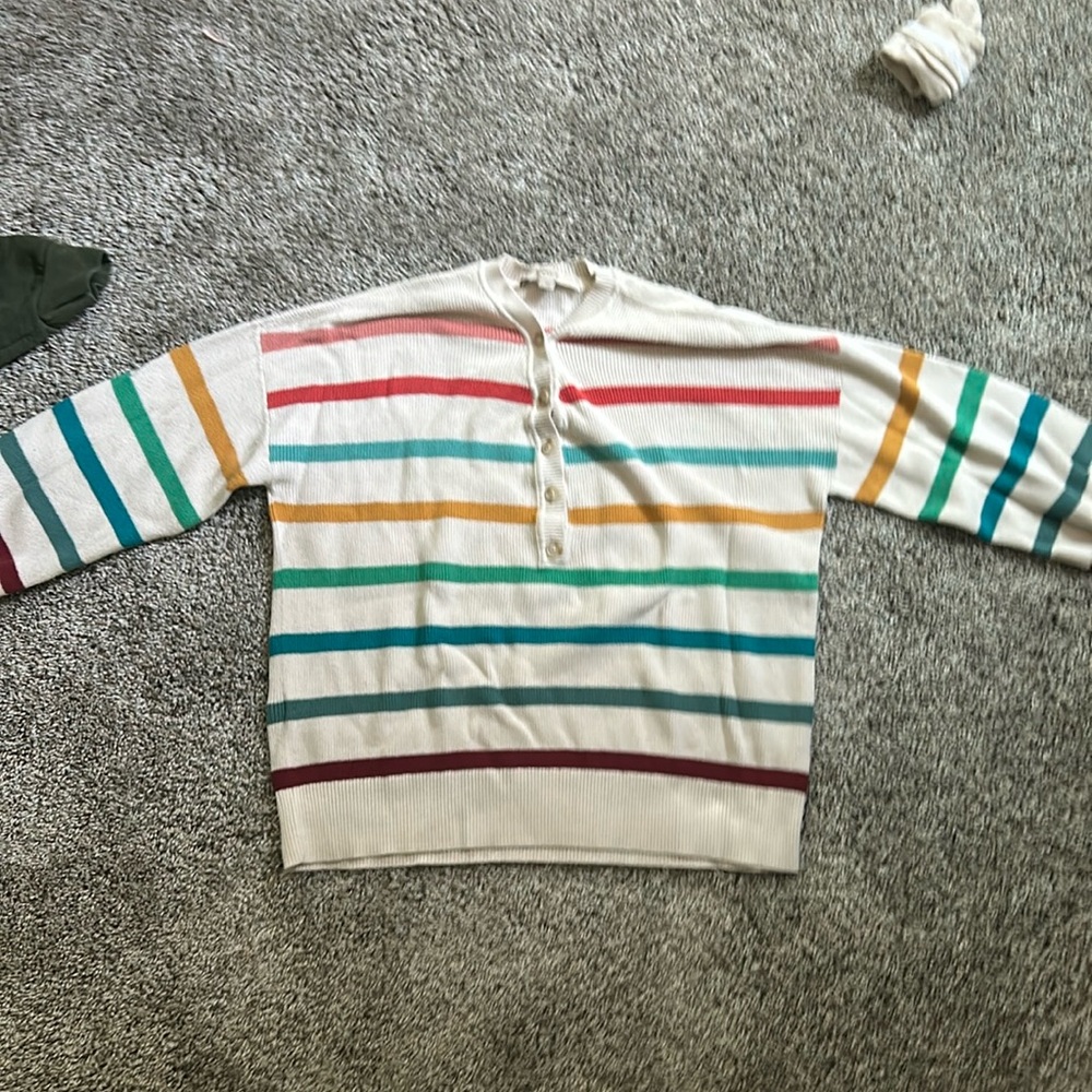 Large rainbow striped sweater.